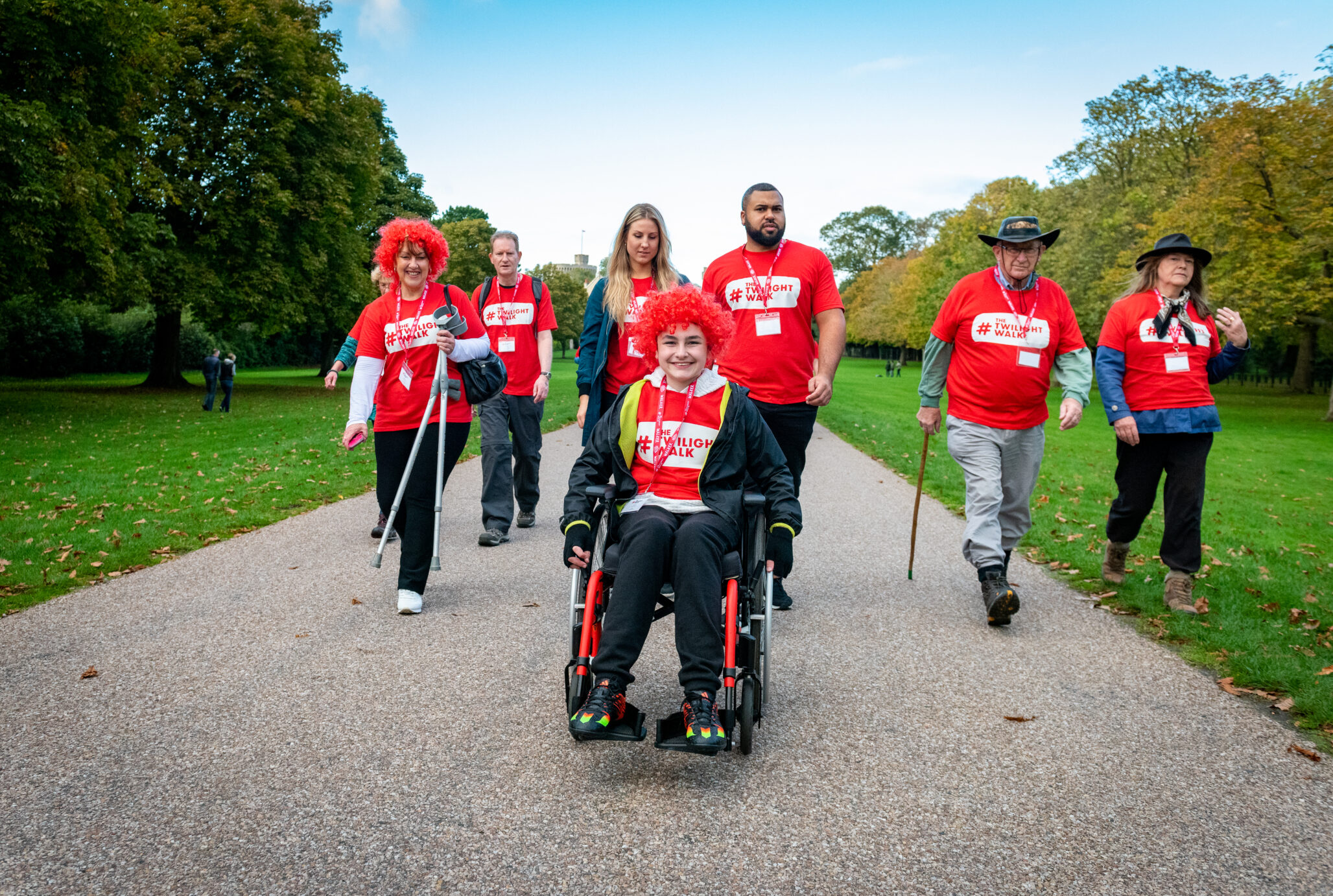 A photo of a diverse group of walkers marching towards progress at The Twilight Walk. Join us throughout Brain Tumour Awareness Month and together we can march towards a world where everyone affected by a brain tumour can live a longer, better life.