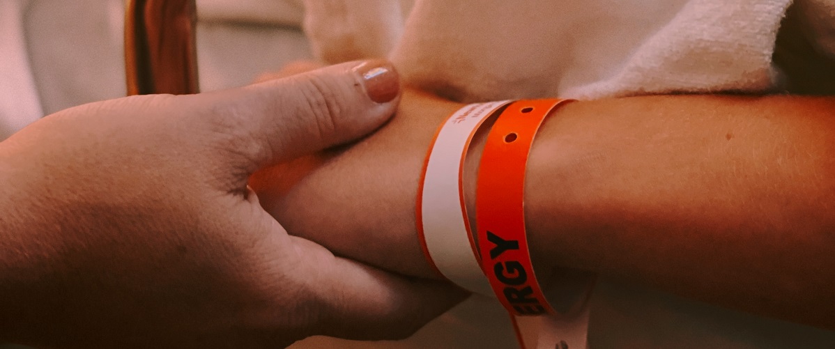 close-up of hands showing support during brain surgery side effects