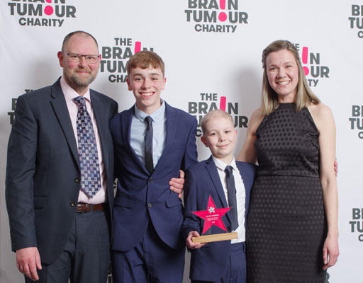 Will Alexander and his family posing for a photo after Will received the Celebrating You 2023 Young Fundraiser of the Year award.