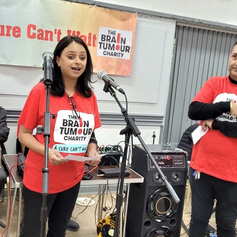 Baljit Ahluwalia giving a speech while volunteering for The Brain Tumour Charity