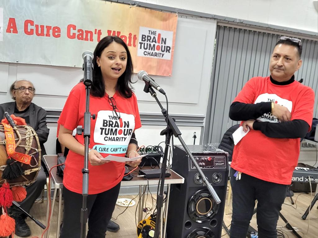 Baljit Ahluwalia giving a speech while volunteering for The Brain Tumour Charity