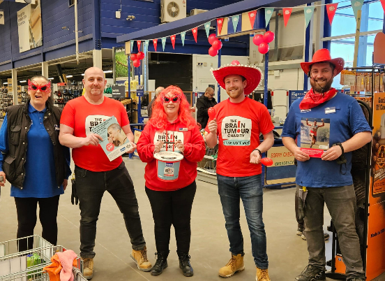 Wickes staff celebrating the launch of our new partnership by dressing in red and raising funds in store.