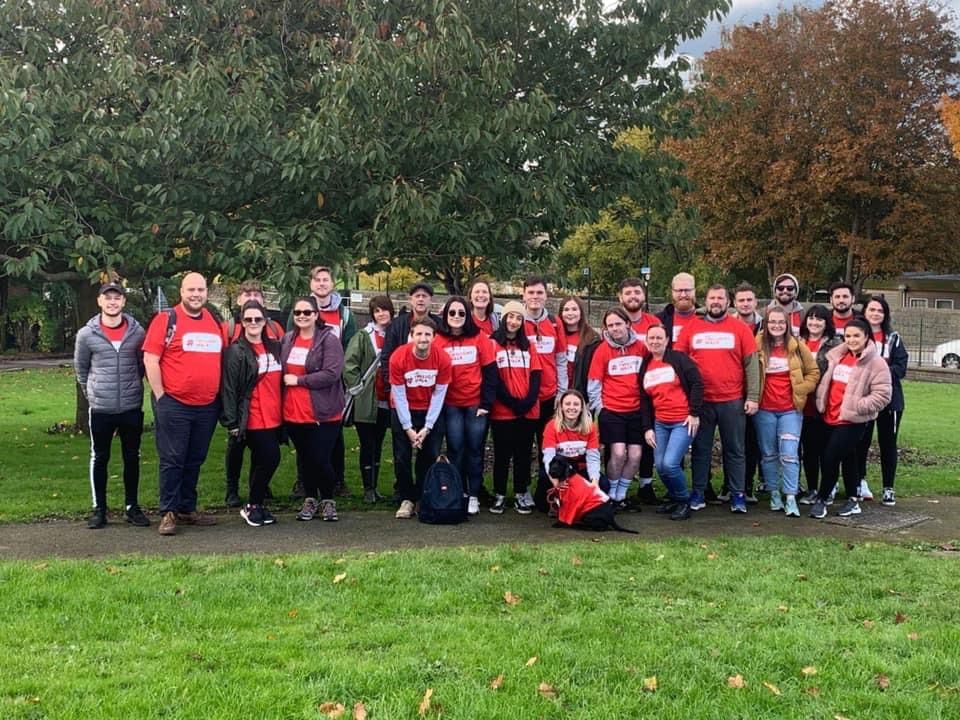 Lots of Mia's friends and family in red Twilight Walks T-shirts to raise money for The Brain Tumour Charity who fund vital glioblastoma research.