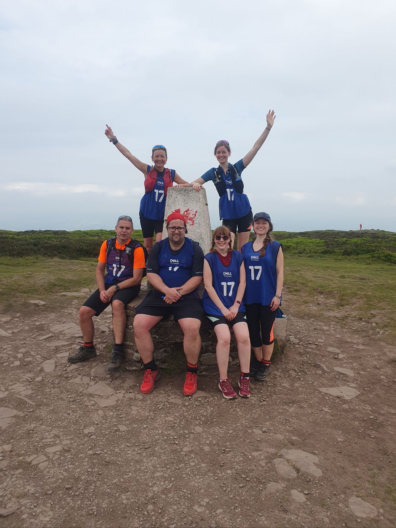 The Brain Tumour Charity team smile after cycling up one of the Breacon Beacons