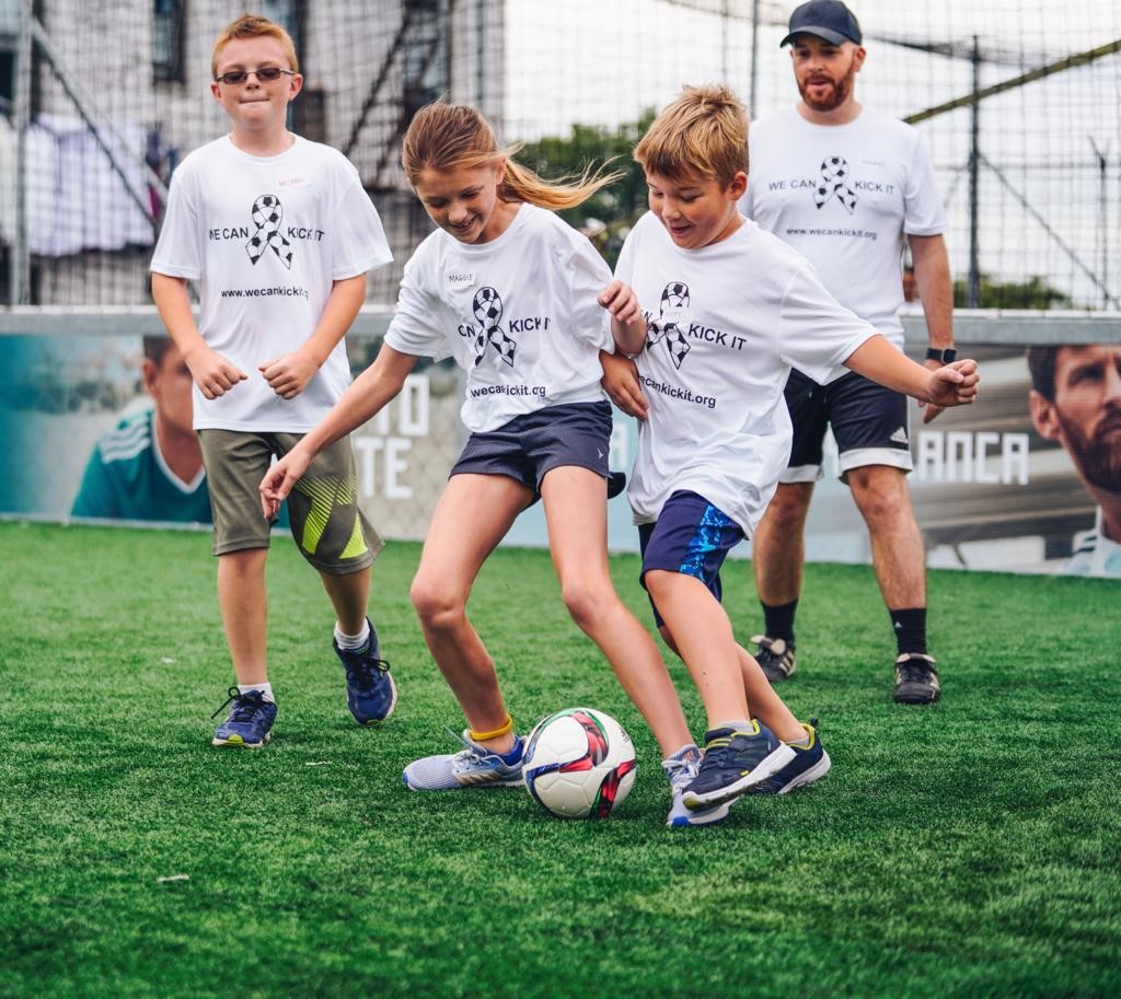 children playing football