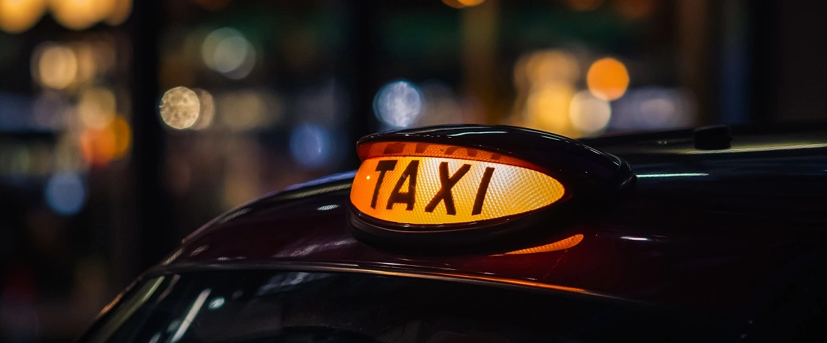 lit-up sign on a London taxi - travelling by public transport if you have a brain tumour