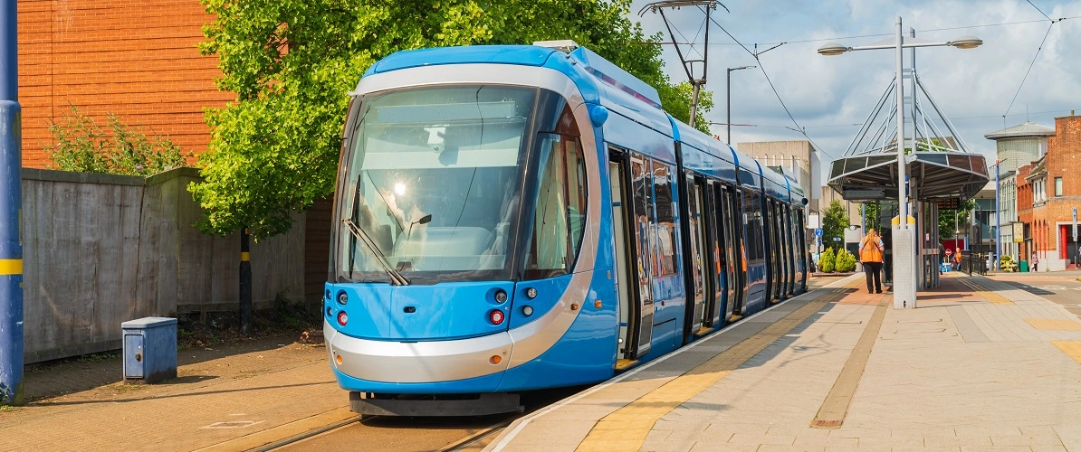 tram pulling away from a stop