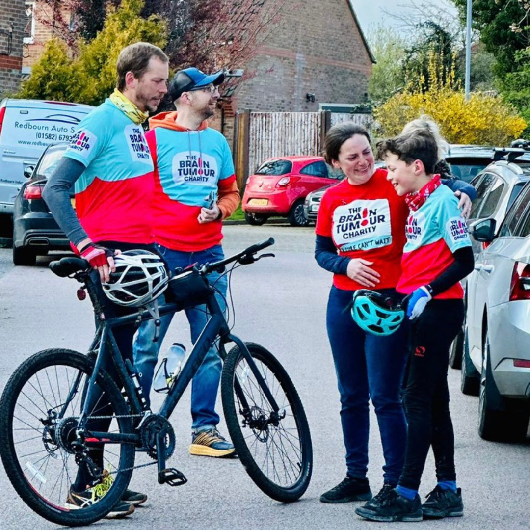 Harry Smith with his parents with their bikes after a 75km ride.