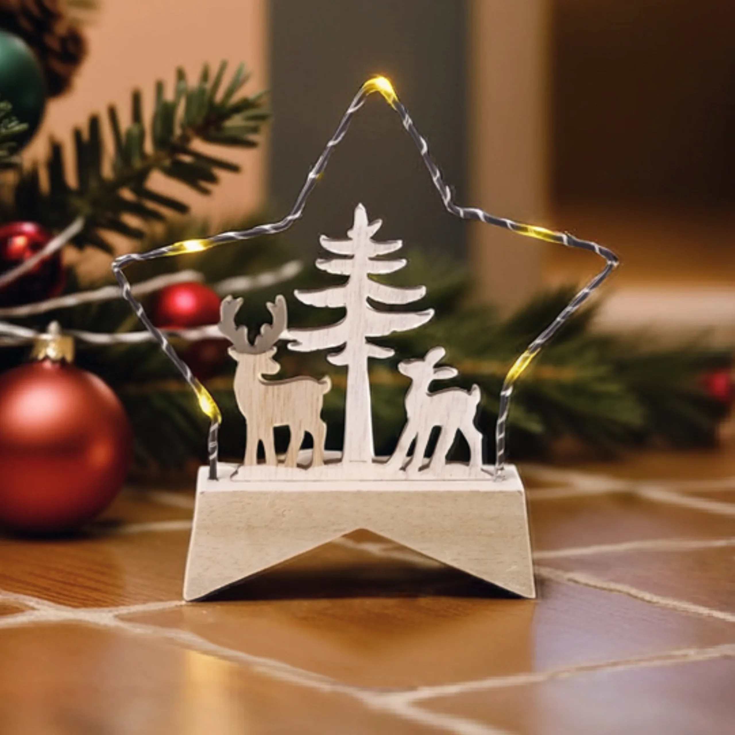 Light Up Star Forest Scene Christmas decoration with Christmas tree in background