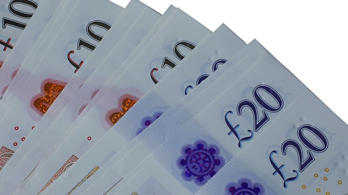 UK bank notes representing financial support, one of the helpful services in our bereavement resources