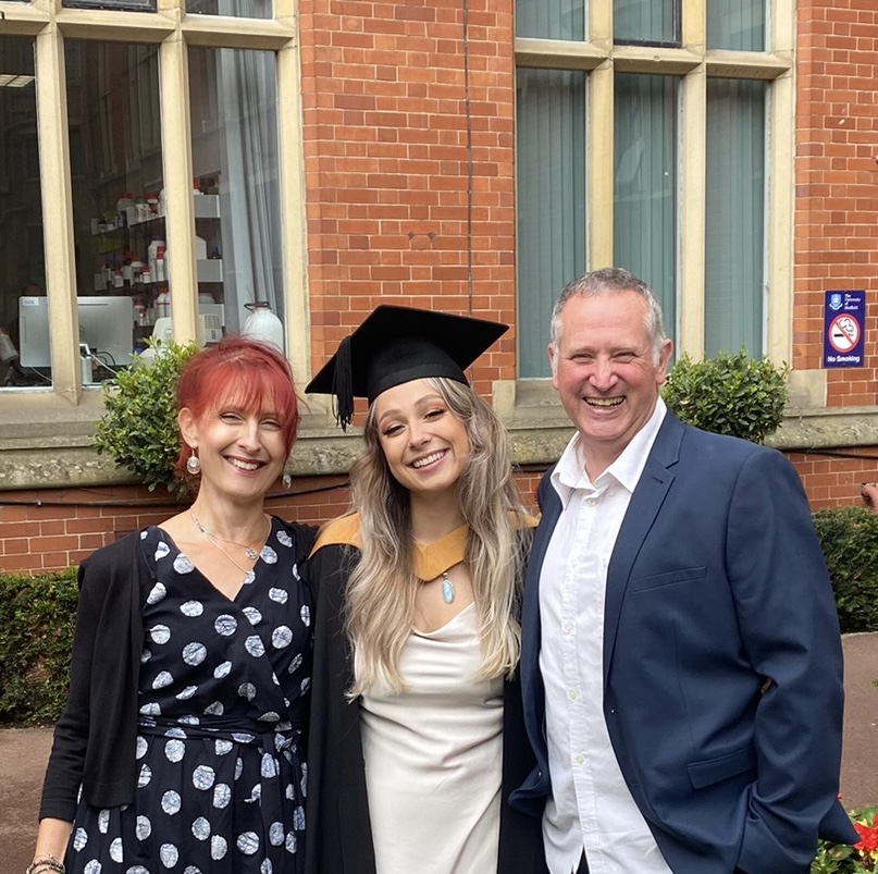 Morgan, who is now a PhD student at the University of Sheffield, with her parents at her undergraduate graduation in 2021