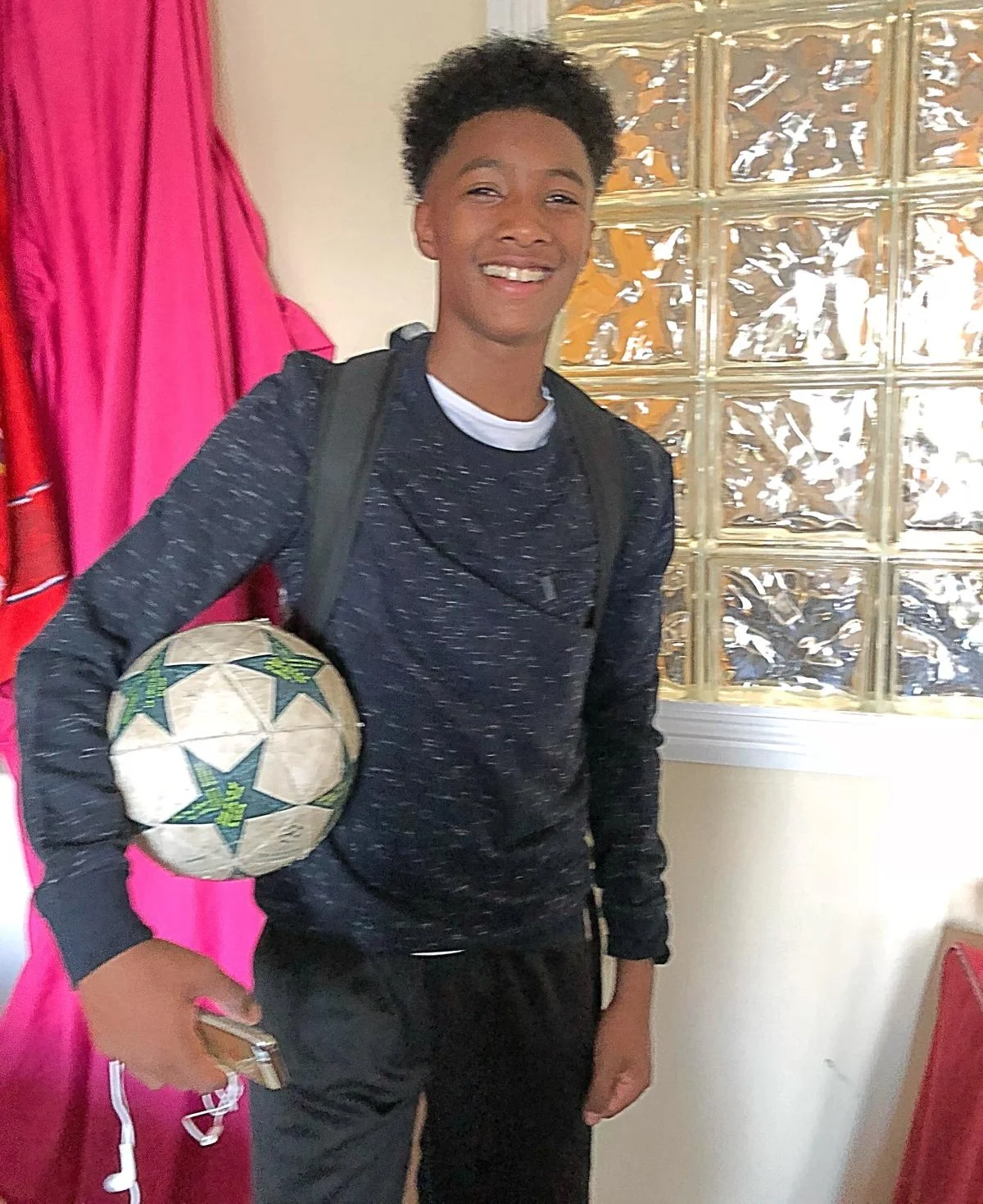 Jake holding a football