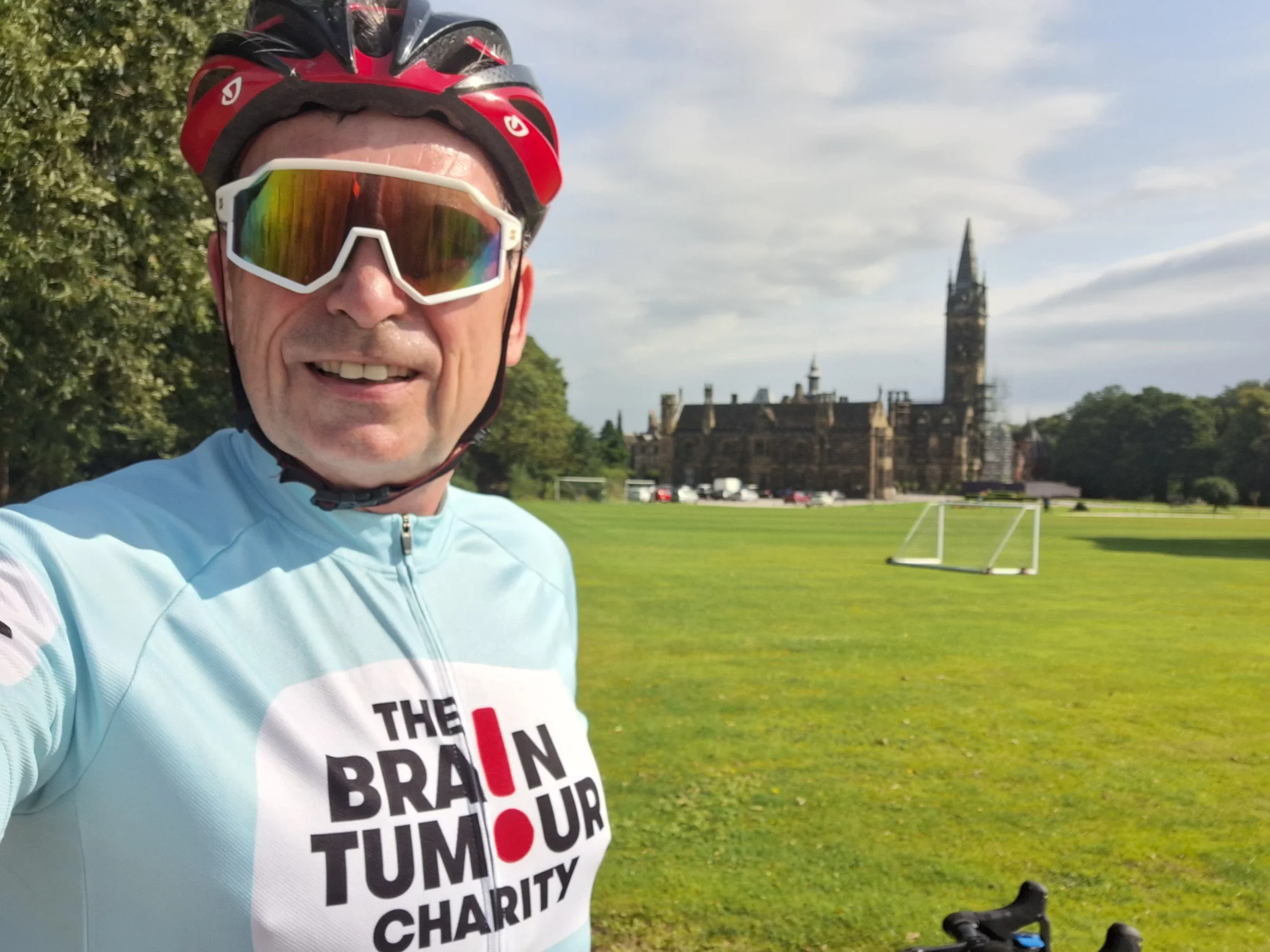 Richard Rawcliffe takes a selfie on his bike during a cycling fundraising event