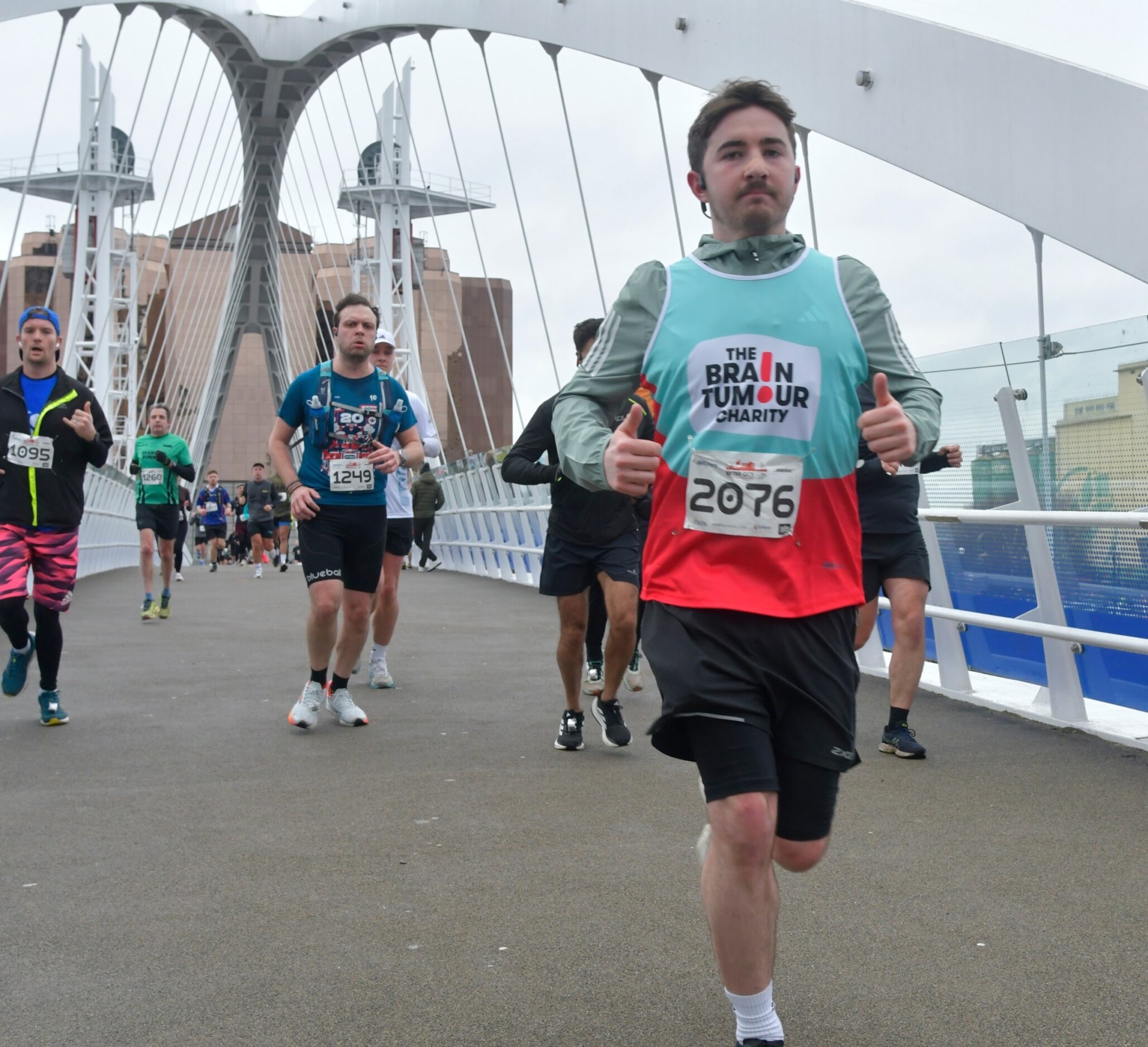 Will running across a bridge during a marathon. He's taking on the Berlin Marathon for The Brain Tumour Charity.