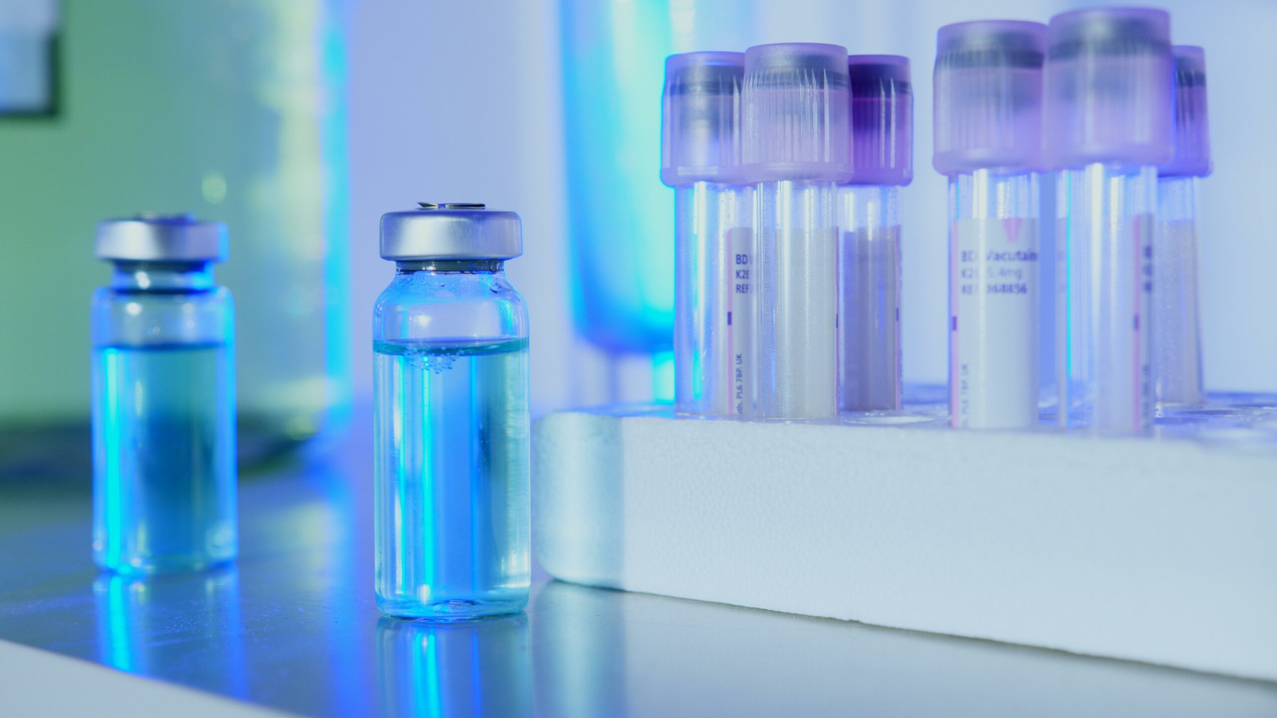 Vials on a table representing a clinical trial for dordaviprone, which is being developed to treat diffuse midline glioma