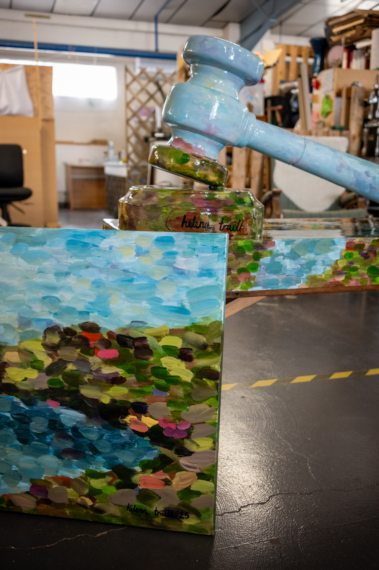 A painted gavel and painting will be part of a sculpture auction for charity