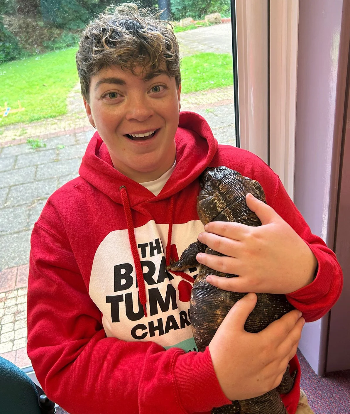 Mel holding an animal