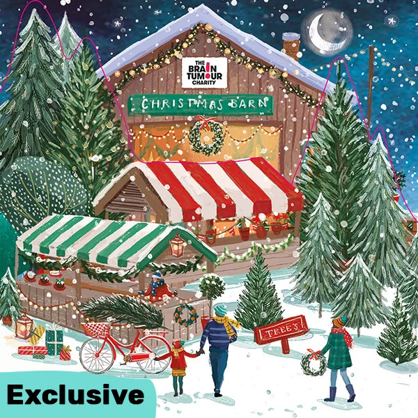 The Brain Tumour Charity Christmas Barn Christmas Card featuring a snowy barn covered in lights