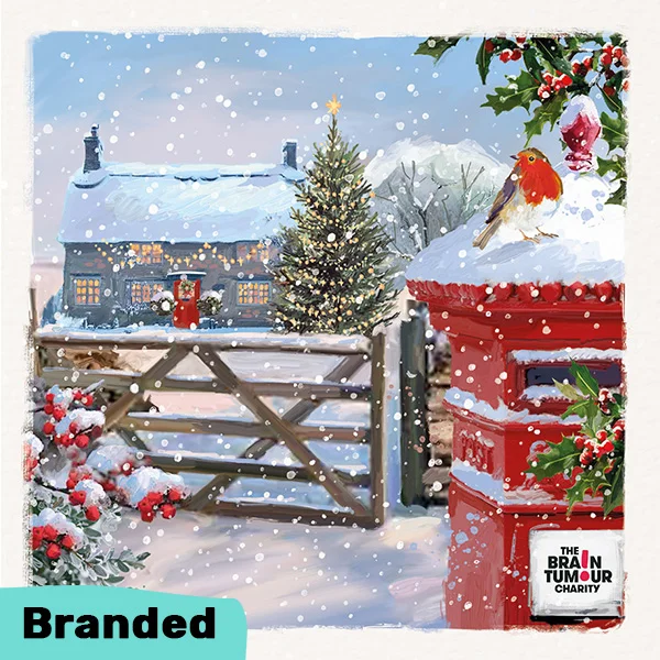 Countryside Christmas card featuring a postbox and snowy cottage