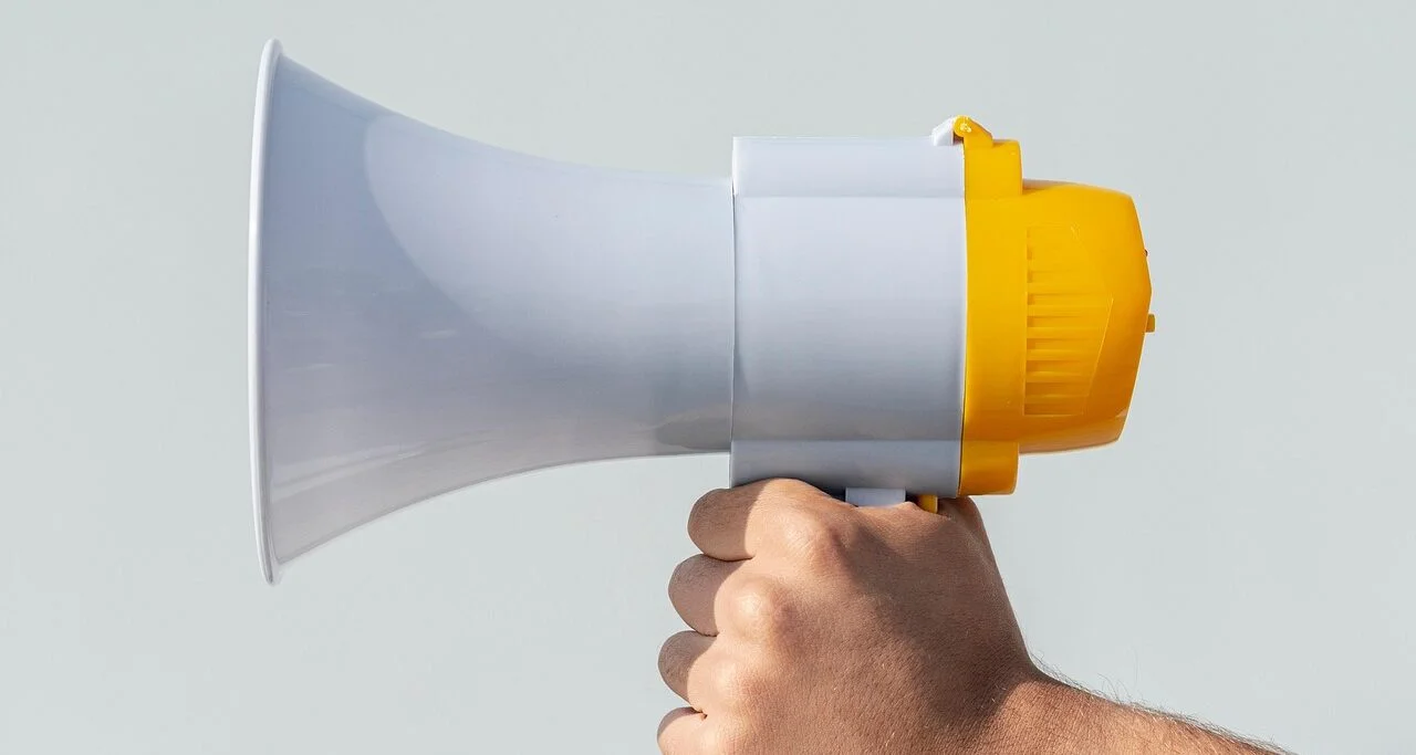 megaphone loudspeaker in a hand