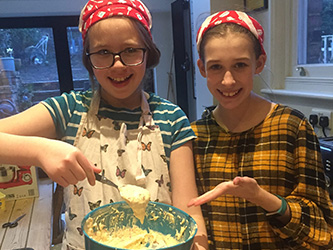 Lily Hemsley and friend baking