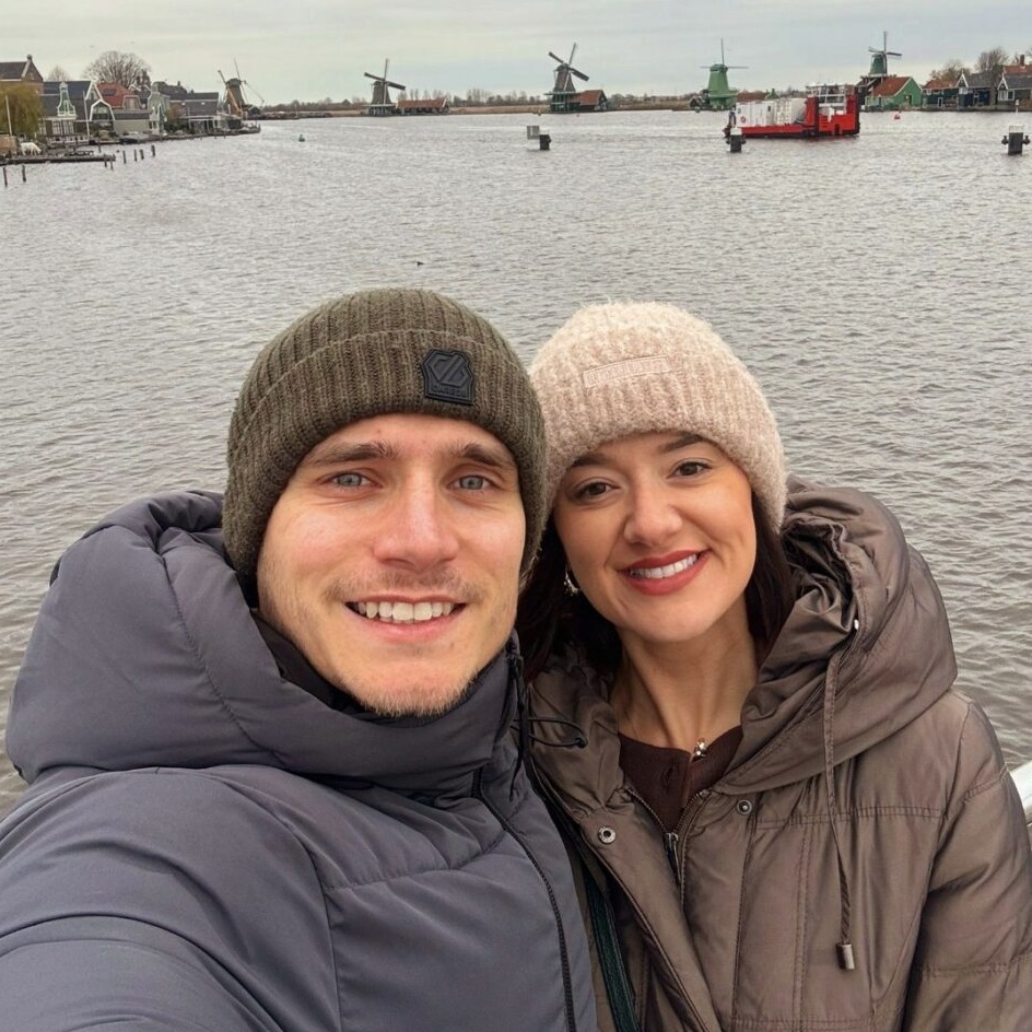 Mitch and Gemma with windmills in the background