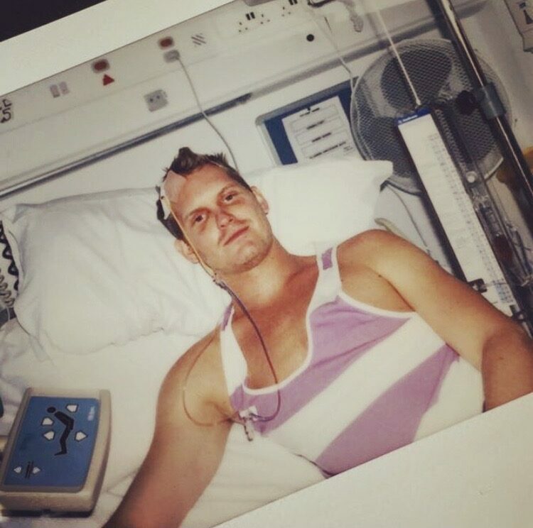 Rod lies in his hospital bed post surgery