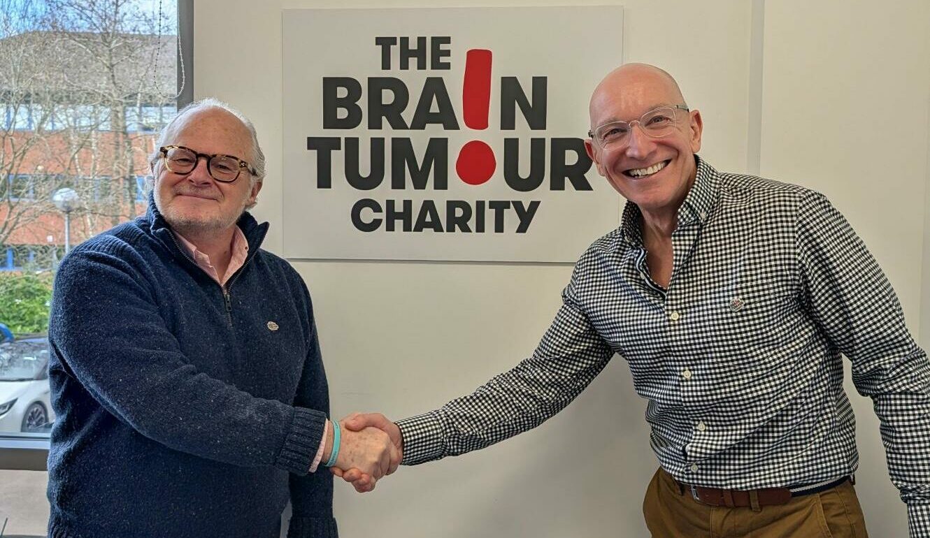 Jack Morris shaking hands with Fraser Longden, who is our new Chair of Trustees