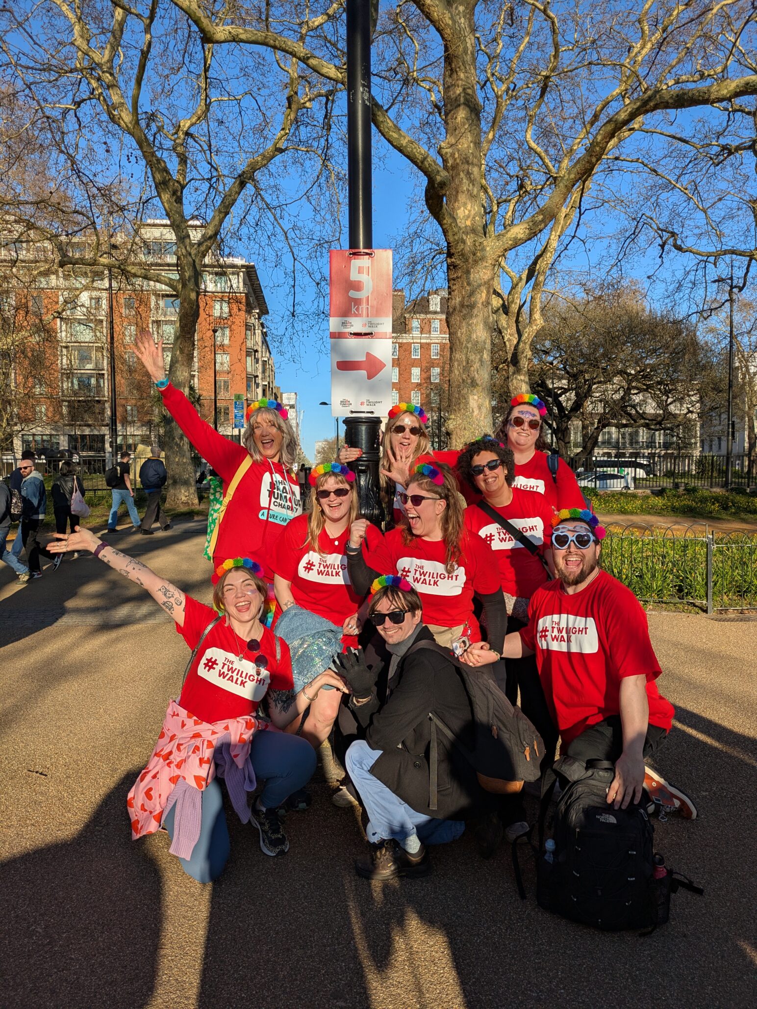 A group of walkers wearing red at The Twilight Walk
