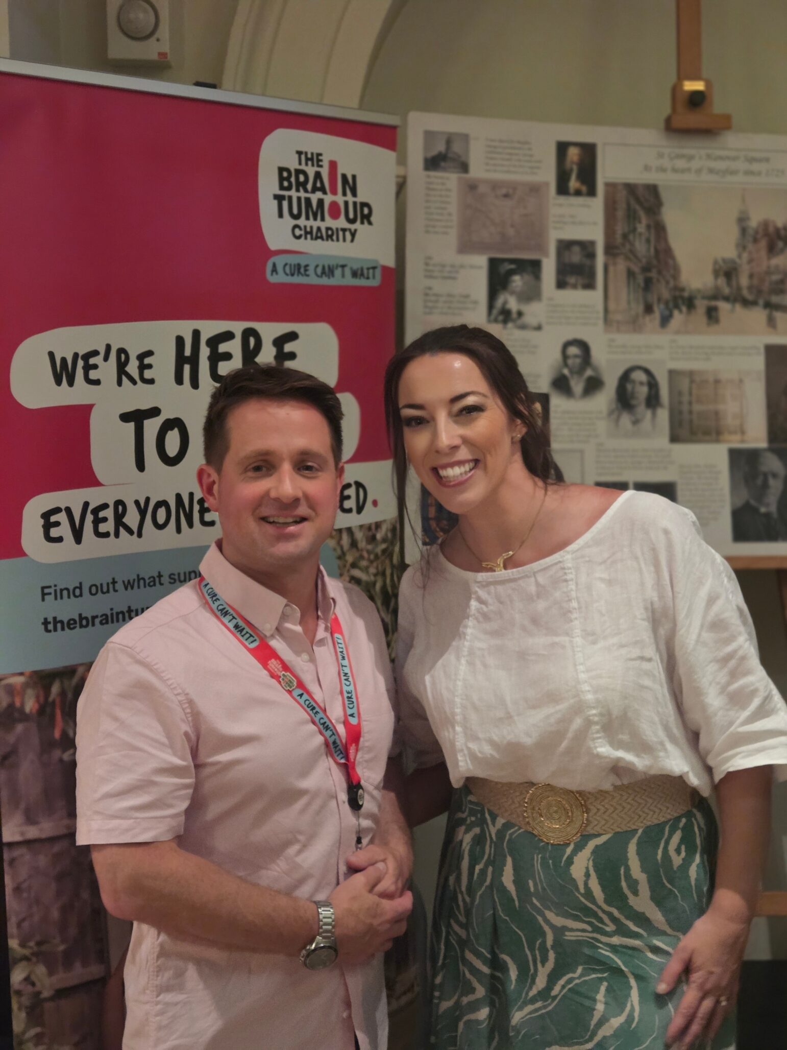 Claire Bullimore standing with Piers Townley of The Brain Tumour Charity