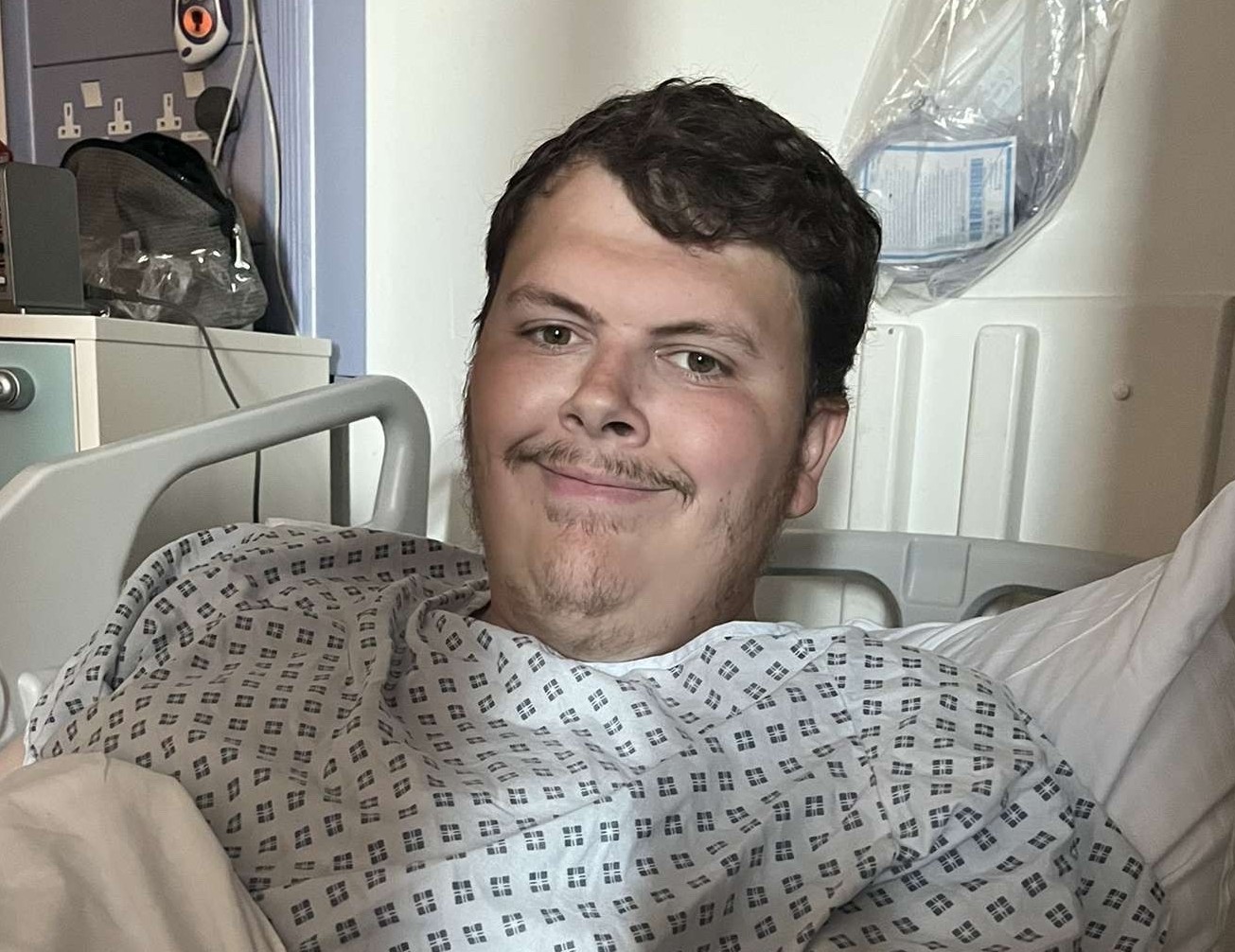 Callum Blackwell in a hospital bed